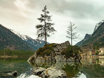 Hintersee: a small island in the middle of a lake surrounded by mountains