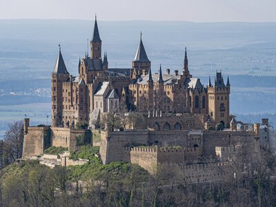 Burg Hohenzollern: a castle on a hill with Hohenzollern Castle in the background