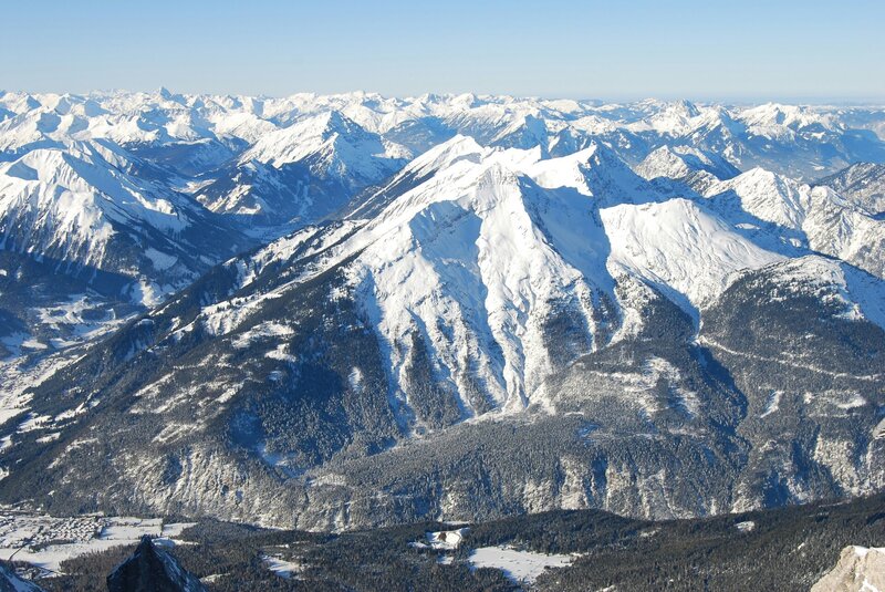 a mountain range covered in snow