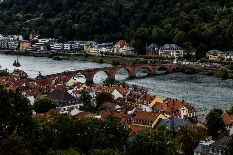 A river running through a city next to a bridge