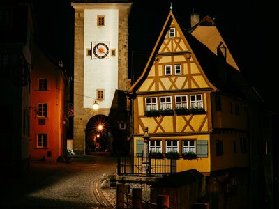 Plönlein: a tall building with a clock on the side of it