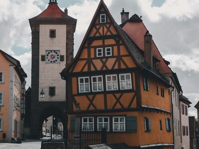 Plönlein: a building with a clock on the side of it